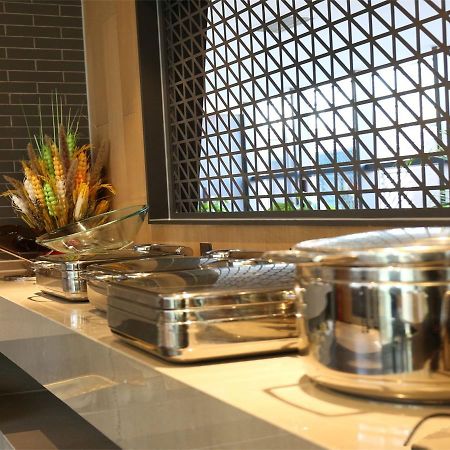 Qiu Guo Hotel Hua Mao Chaoyang  Экстерьер фото